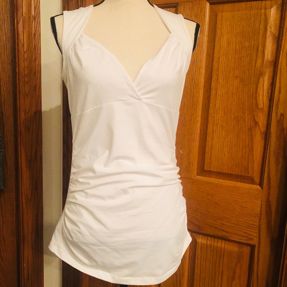 White sleeveless blouse size L